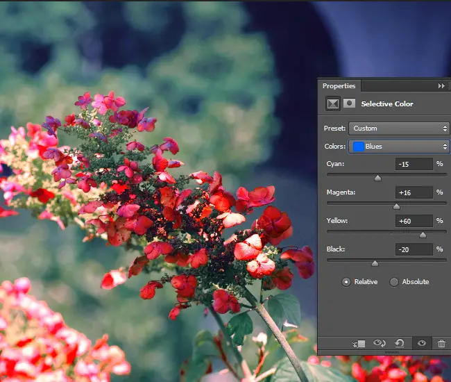 Adjust the intensity of the CMYK values for the Blue areas of the photo. 