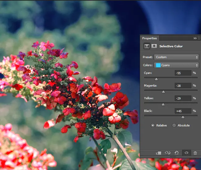 Adjust the intensity of the CMYK values for the cyan areas of the photo. 