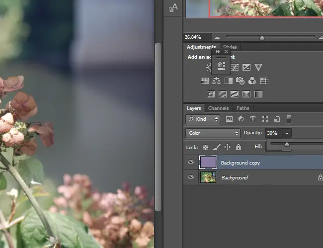 Change the opacity of the layer to 50% or lower depending on how much correction is needed.