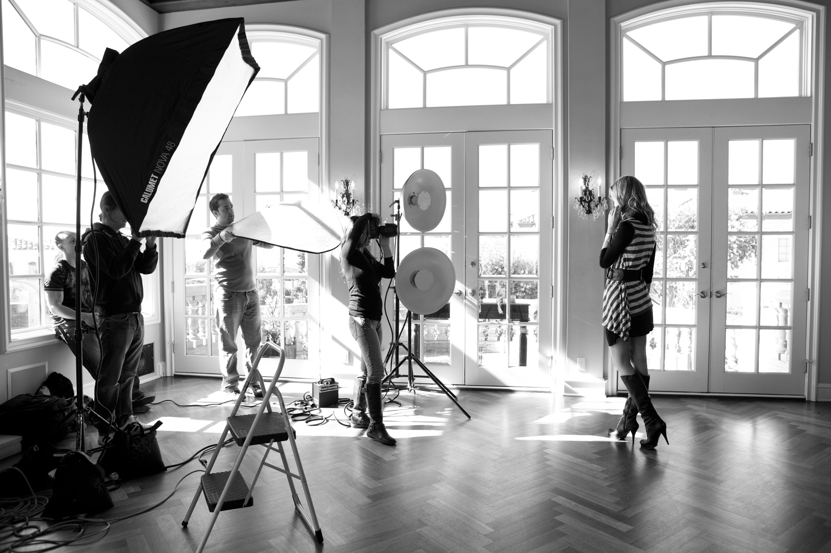 A standard set up, with soft boxes, reflectors, beauty dishes and a good source of natural lighting