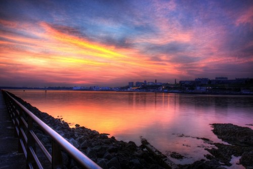 I took this photograph in my hometown of Plymouth in the South West of England, I made a few adjustments in post, but I spent most of my time freezing waiting for the sunset to do something interesting...