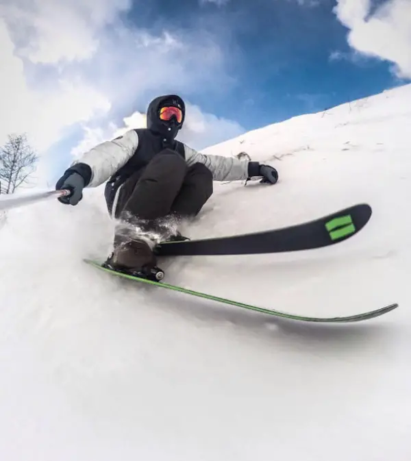 skier with gopro on ski pole