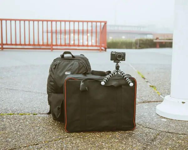 camera on tripod on bag