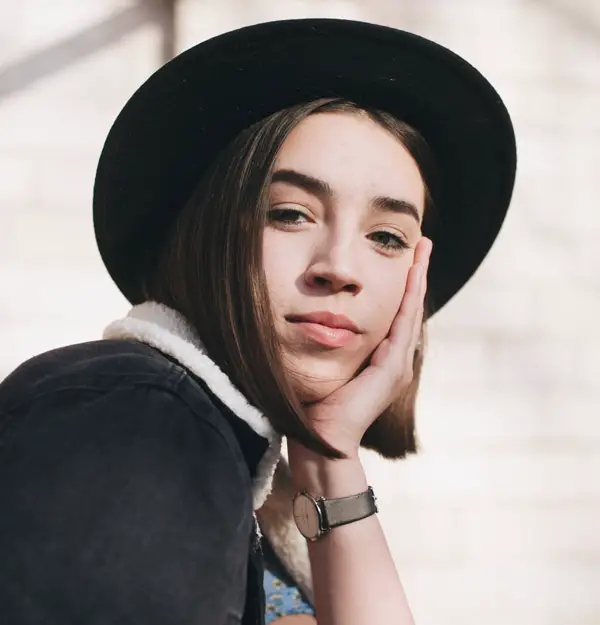 woman in hat and makeup