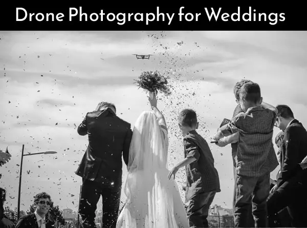 drone flying over wedding party