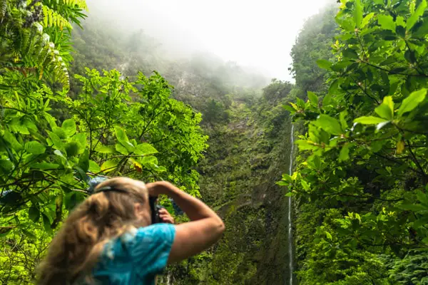 photographer and waterfall