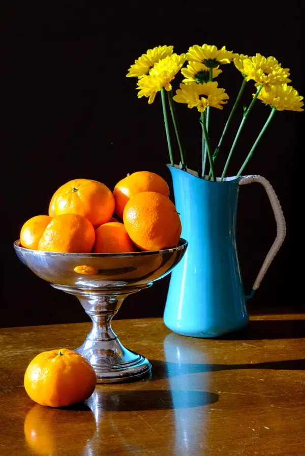 still photo of flowers and fruit