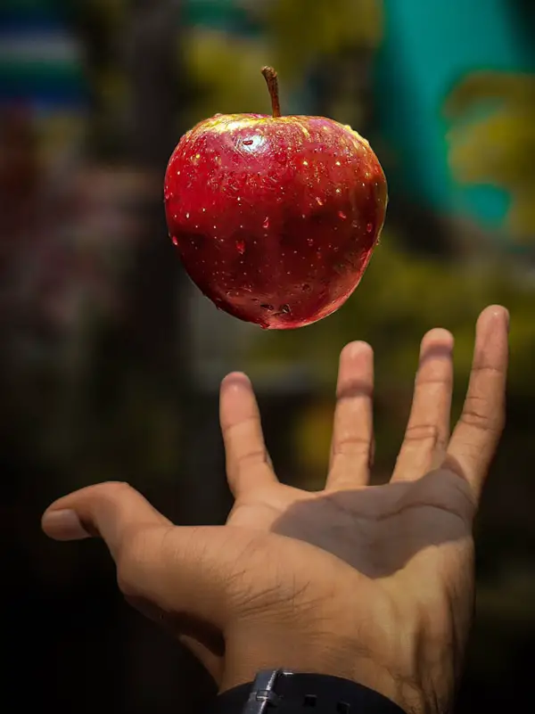 apple thrown in air