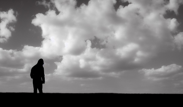 man silhouette against an empty sky