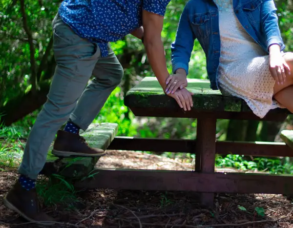 man and woman engagement photo