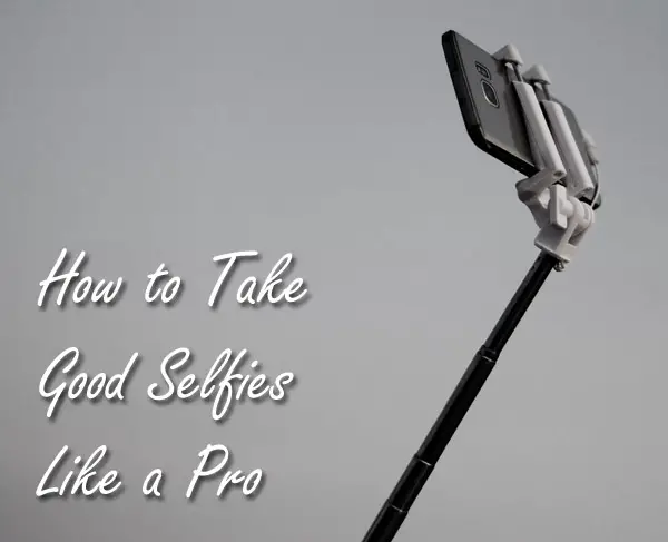 Selfie using a selfie stick and smartphone