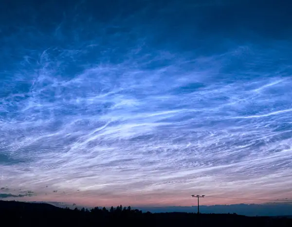 Photo of noctilucent clouds