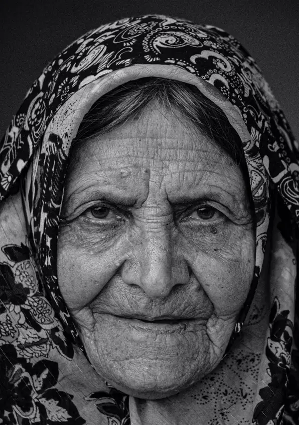 Portrait of elderly woman from another country