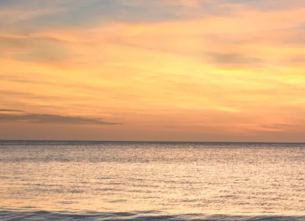 Subtle light of the golden hour at the beach