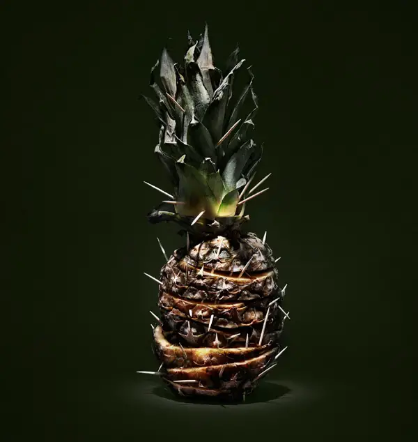 Photo of prepared pineapple in dark lighting